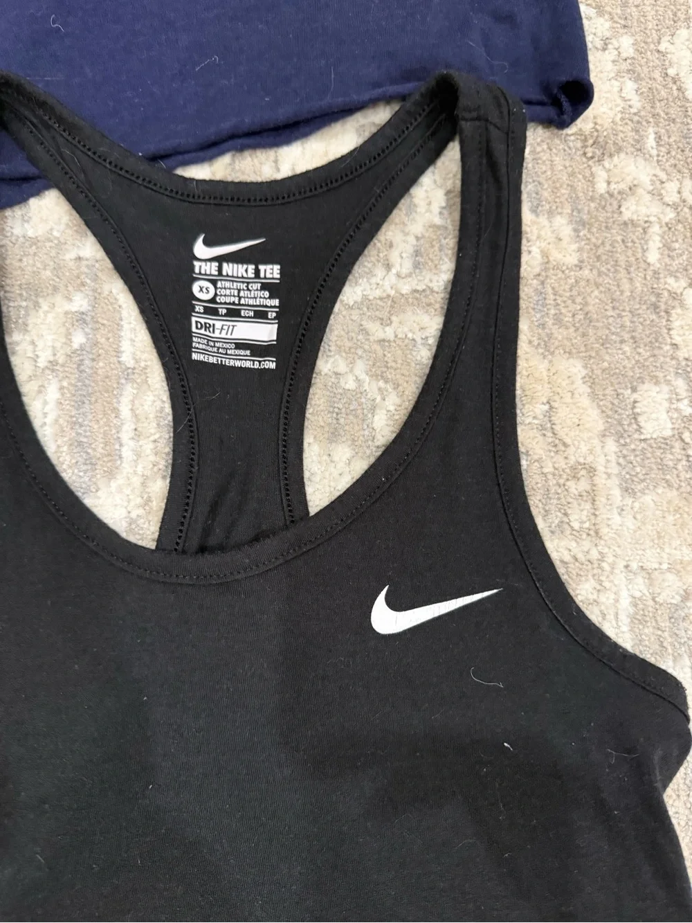 Nike Black Racerback Crop Tank Top and blue under armour crop tank